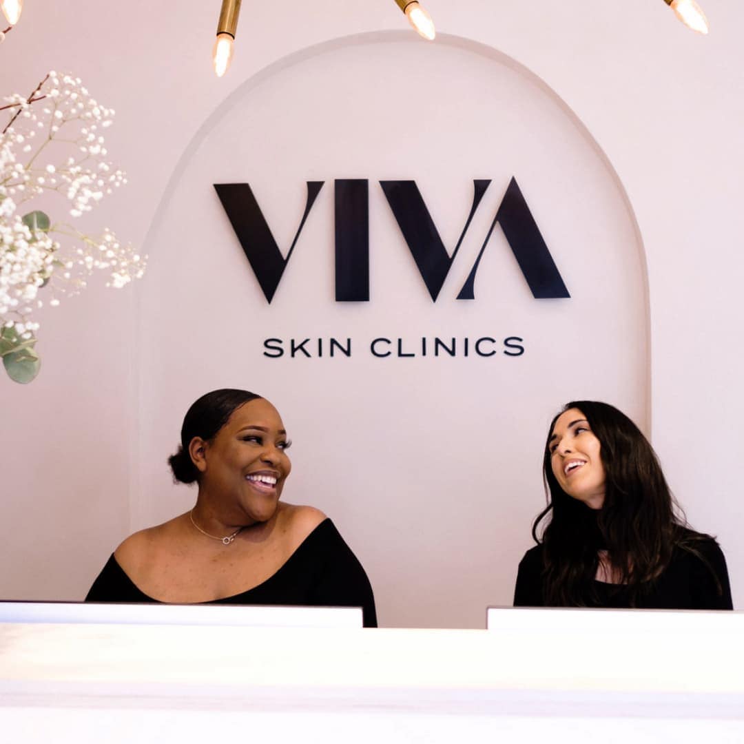 Team photo of front desk at VIVA