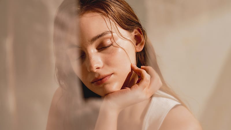All Treatments 36 sculptra treatment for a woman with clear healthly skin.